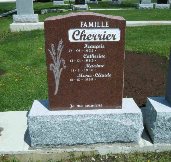 Modern headstone with red granite